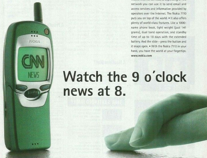 An advertisement showcasing the Nokia 7110 mobile phone.