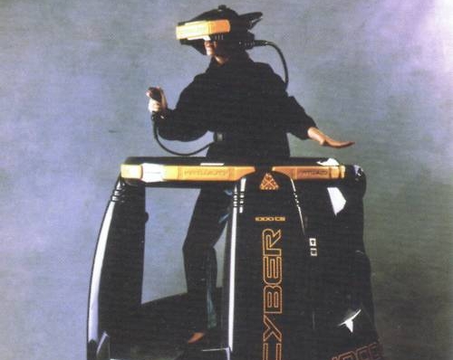 A person wearing a VR helmet for playing a computer game.